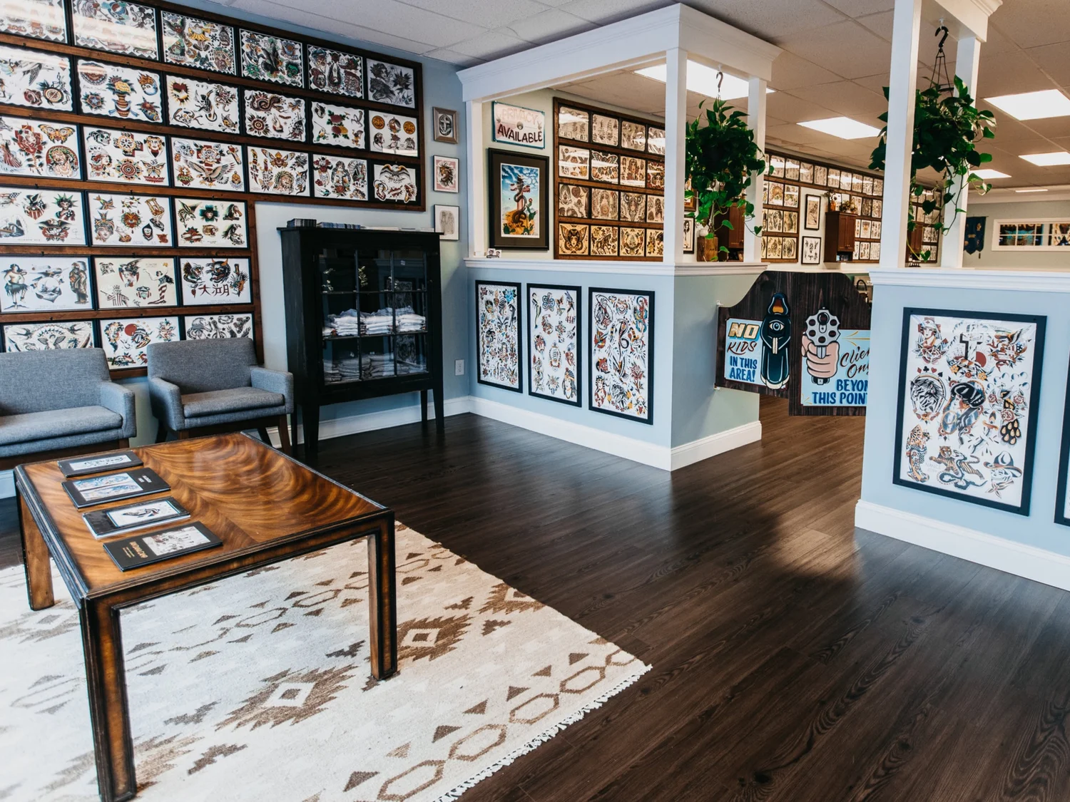 Victory Tattoo studio flash wall